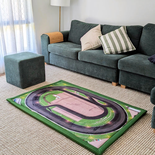 The Mini MyRaceMats speedway play mat, 100cm x 150cm, showing the dirt-oval race track layout